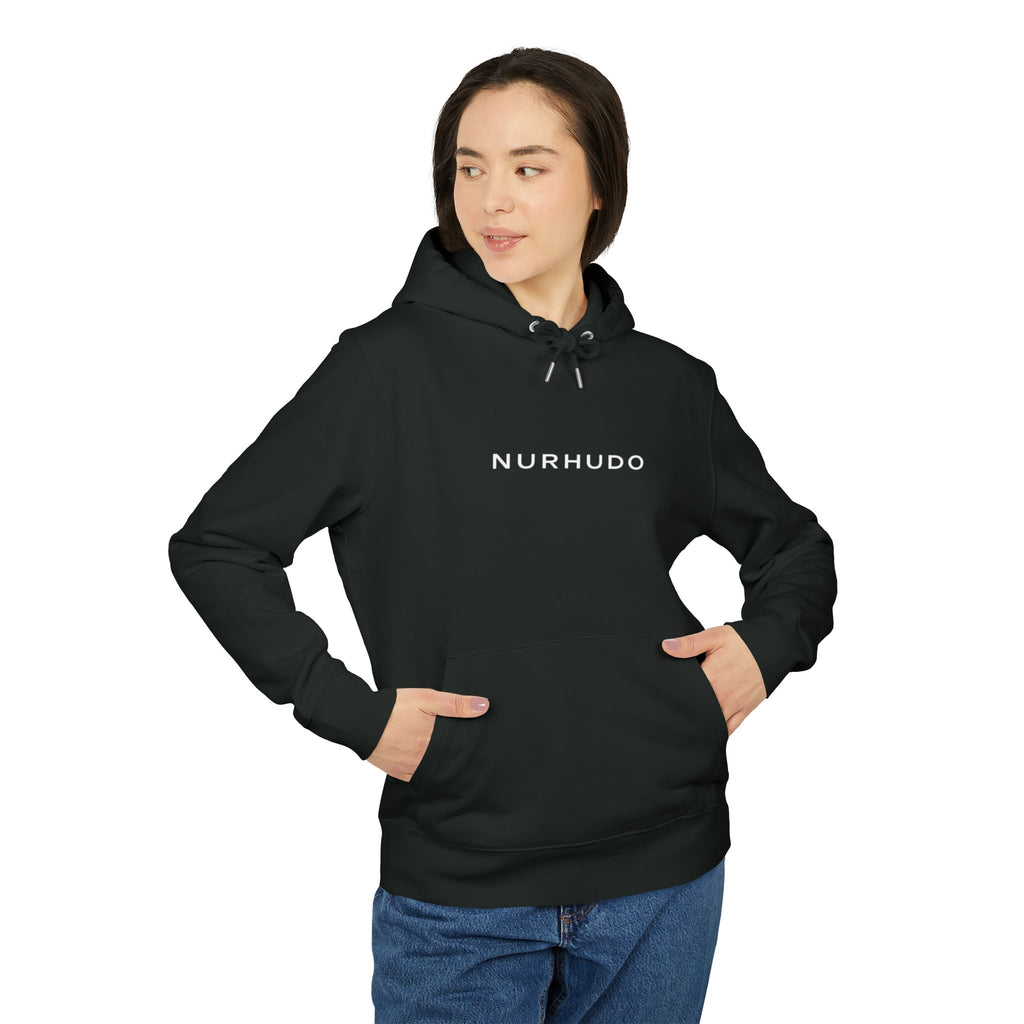 Person wearing a black hoodie on a white background